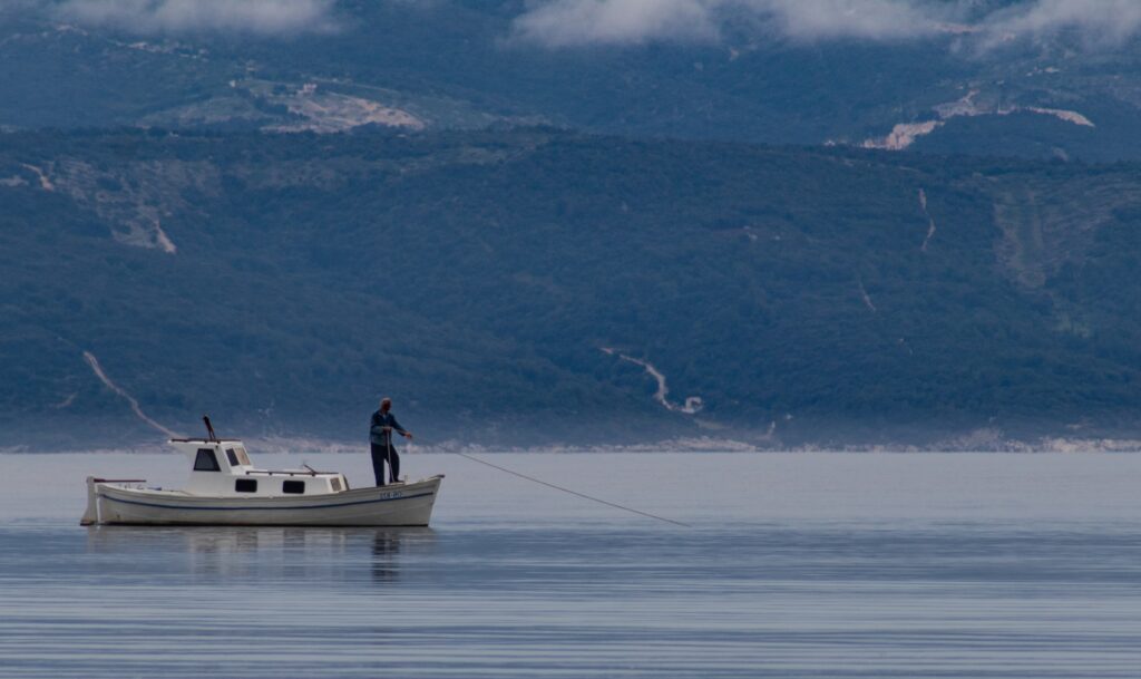 Fishing boat in the ocean with sustainable practices