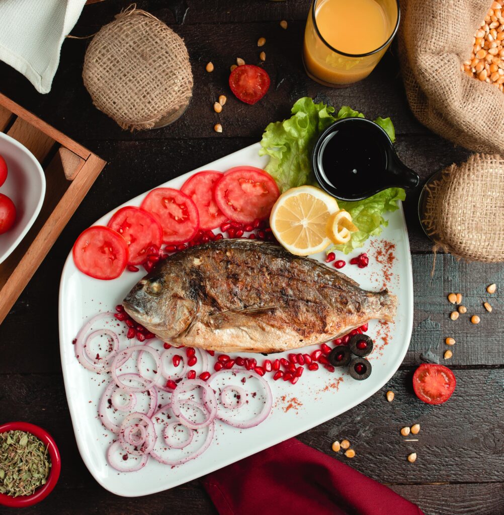 Grilled rockfish served with vegetables