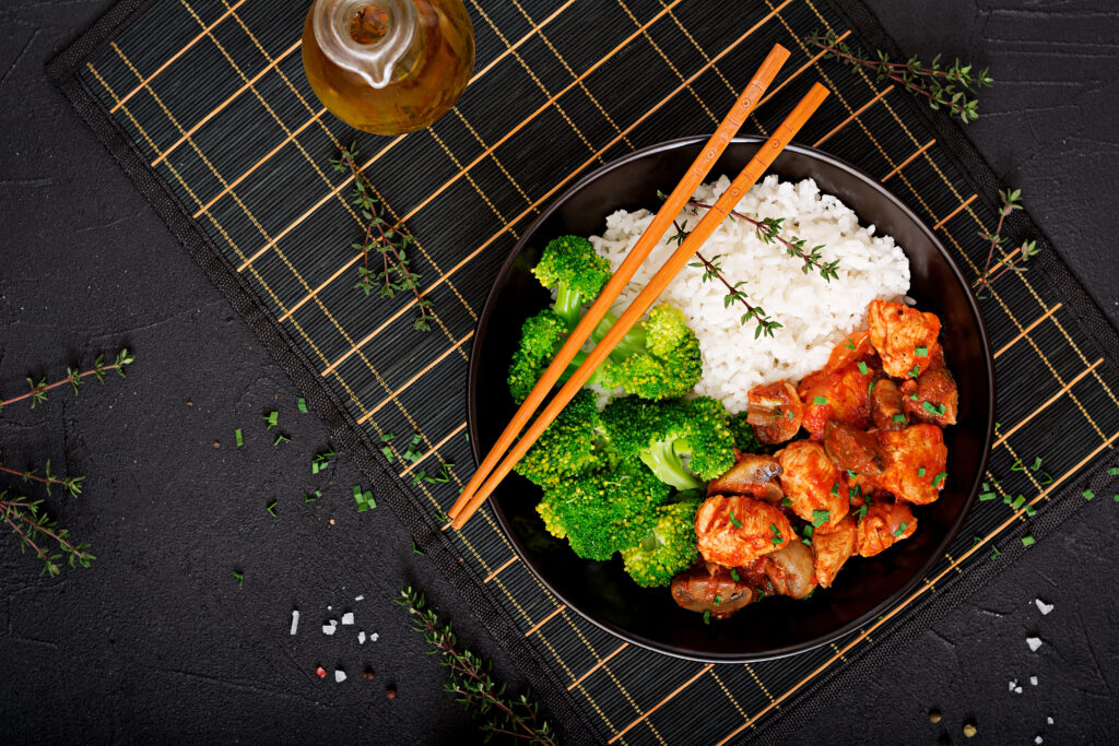 Teriyaki chicken bowl with rice and steamed broccoli