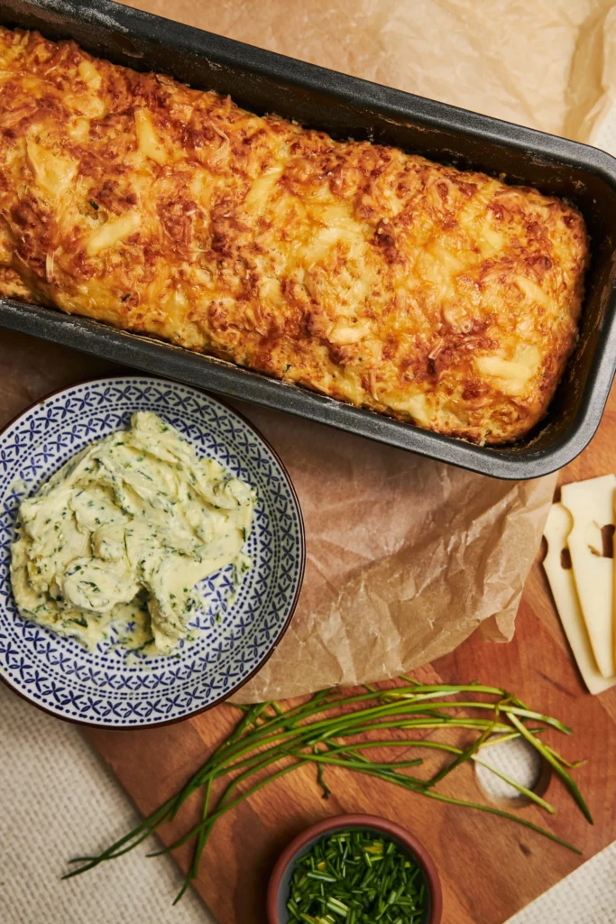 turkey cabbage casserole served on a plate of butter